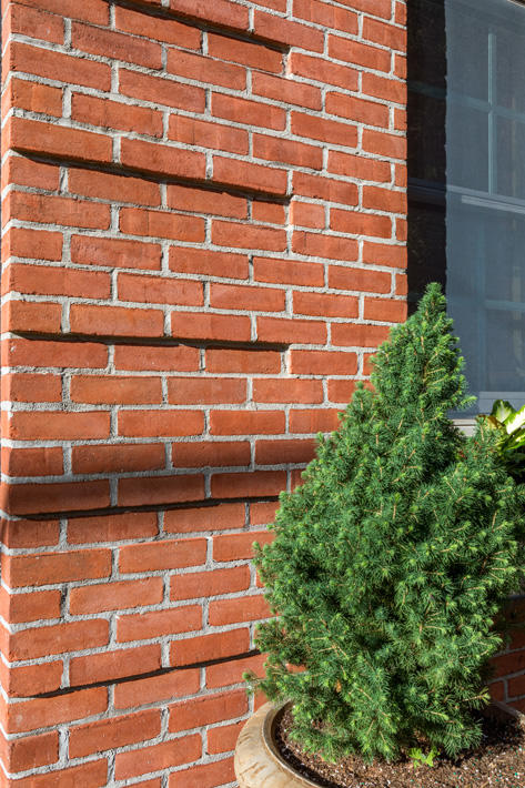 Brick Home with Rose Red Range