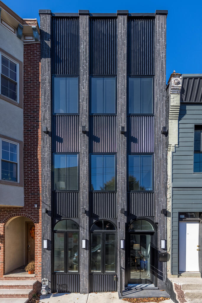 Brick Home with Black Roman Maximus