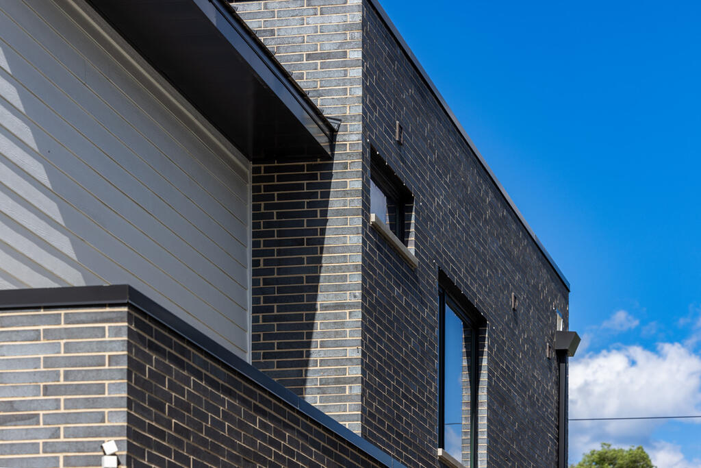Brick Home with Ebonite Smooth