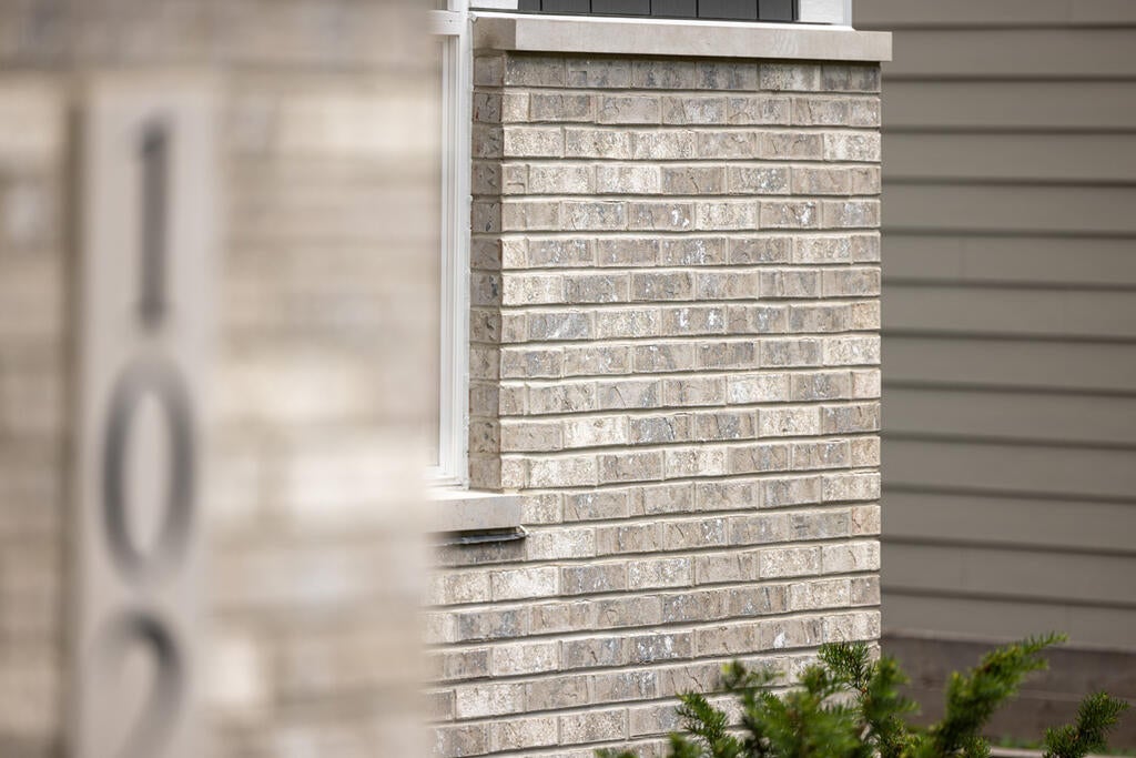 Brick Home with Gauntlet Slate