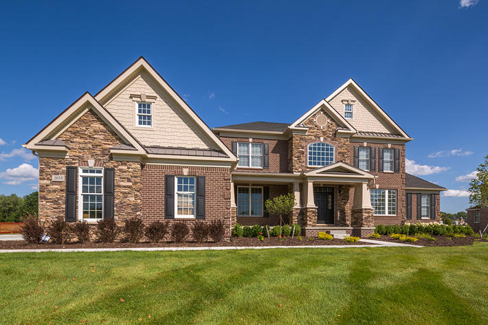 Brick & Stone Home with Battle Creek & Buckingham Ledgestone