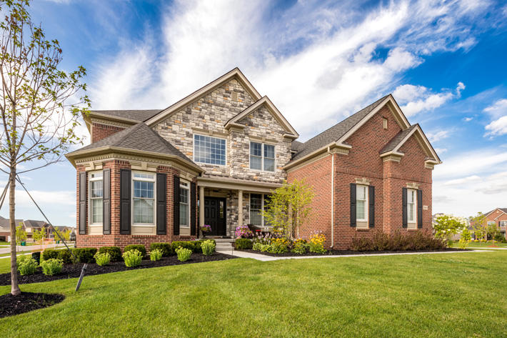 Brick & Stone Home with Tudor Williamsburg & Kentucky Gray Limestone