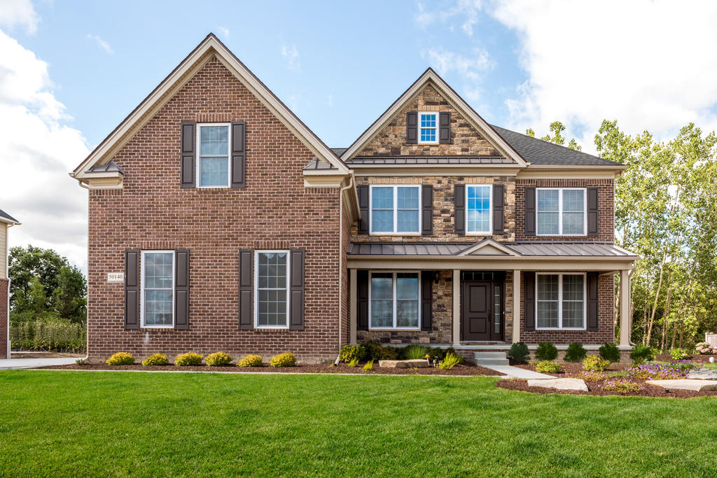 Brick & Stone Home with Battle Creek & Buckingham Limestone